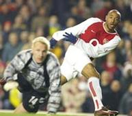 Henry takes Arsenal five clear