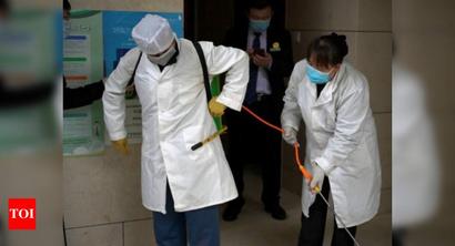 Chinese capital battles jump in virus cases as infections ease elsewhere